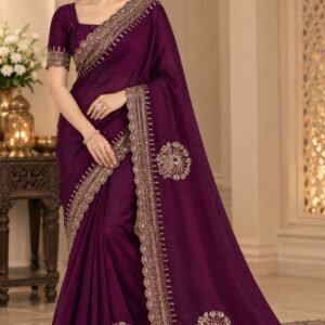 Wine purple designer saree with gold embroidered border and floral motifs